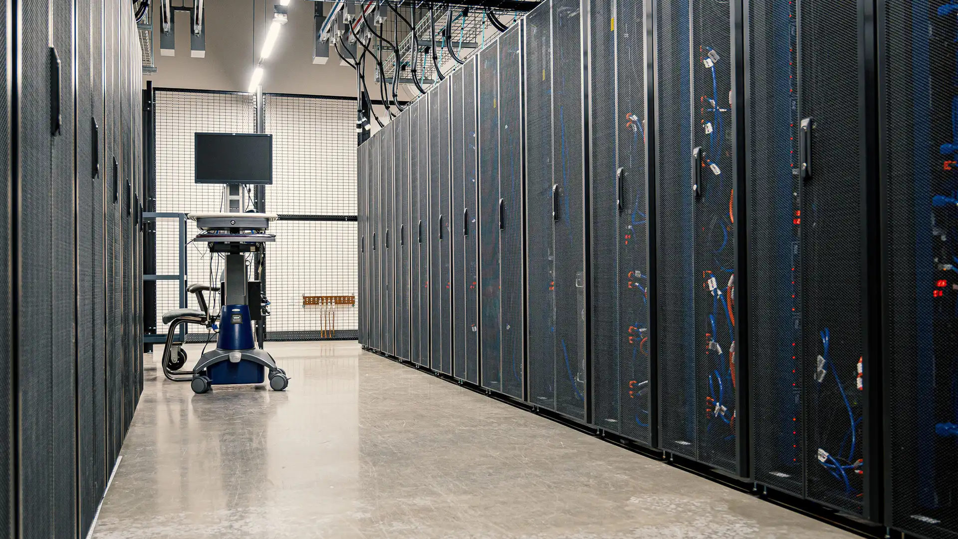 Aisle between server racks in a data center hall